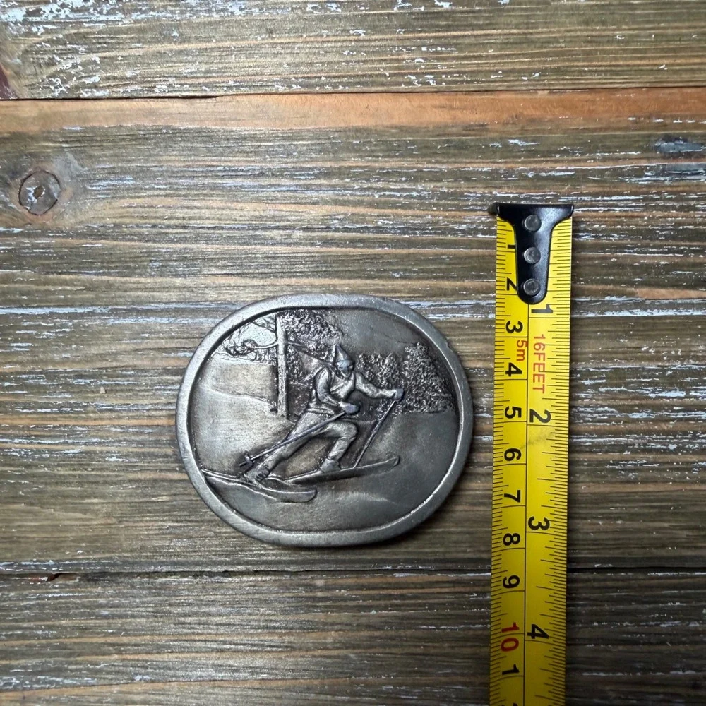 Vintage 1977 Indiana Metal Craft Alpine Skier Belt Buckle Silver Tone Oval 70s